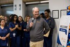 Dr. Mike Uselton shares remarks during the ribbon‑cutting ceremony.