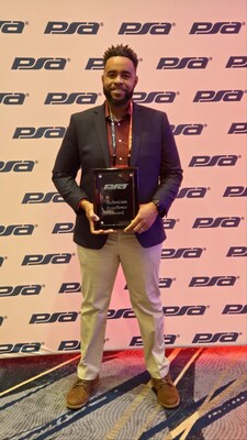 Dominic Drayton with his award Dominic Drayton with his award