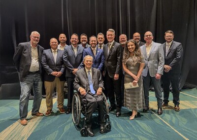 Gov. Abbott (middle) with TACA President Andrew Pinkerton (right) and TACA members at the CIM Scholarship Gala