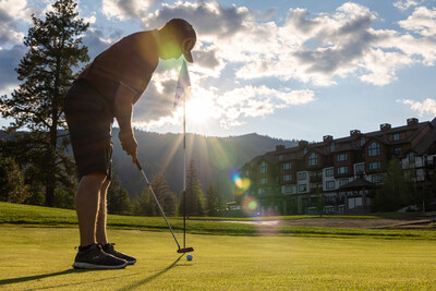 A golfer practices his putting on the Osprey Meadows Golf Course at Tamarack Resort.