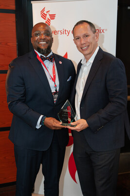 Dr. Chris Townsend, an Alumni Luminaries honoree, poses with his award alongside University of Phoenix President Chris Lynne during the Alumni Luminaries Celebration held April 17–19, 2026, in Phoenix, Arizona.