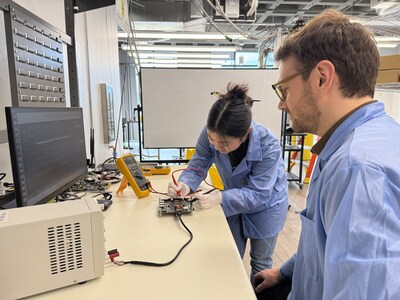 Interlune mechanical engineer Jessica Wu (left) and senior electrical engineer Jonathan Lee (right) test avionics subsystems in the lab at the company’s Seattle headquarters