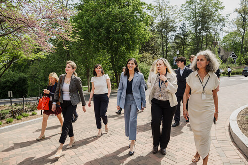 France’s Minister Delegate for La Francophonie, International Partnerships, and French Nationals Abroad Éléonore Caroit and Consul General of France in Washington, D.C. Caroline Monvoisin walk with Head of School Suzanna Jemsby (right) and team members at Washington International School's Tregaron Campus.