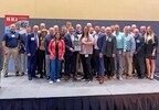 A group representing Coghlin Companies at the 2026 Manufacturing Excellence Awards after being recognized for their leadership in advanced manufacturing.
