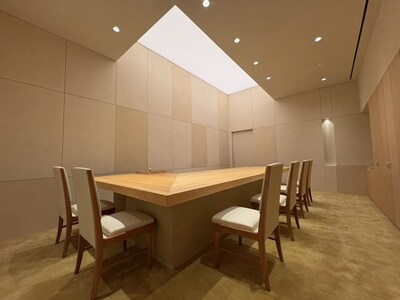 The spaces of MITANI New York are shaped by 'Goshiki,' the five sacred colors of white, yellow, purple, green, and red. This room represents yellow (center) for stability and harmony.