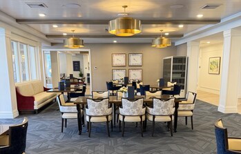Benchmark at Rye's beautiful dining room offers a variety of seating options for residents