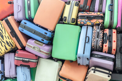Various suitcases stacked together Various suitcases stacked together