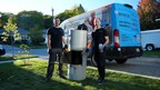 Beyond HVAC co-founders Yuriy and Michael collect a water sample from a residential water heater for laboratory analysis.