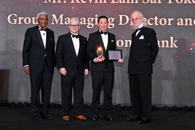 Kevin Lam, HLB’s Group Managing Director & CEO [center left] receiving the awards from Patrick McHenry, former US congressman and Chair of the House Financial Services Committee [center right], alongside Emmanuel Daniel, Chairman of TAB Global [first from left] and Gordian Gaeta, International Resource Director of TAB Global [first from right].
