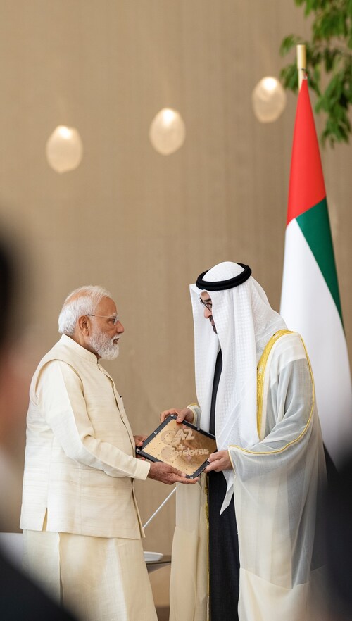 H.H. Mohammed bin Zayed Al Nahyan and Prime Minister Narendra Modi holding Cerebras' Wafer Scale Chip.