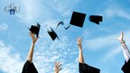 Graduates toss their caps into the air in celebration.