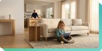Parent watches as child uses ipad with music