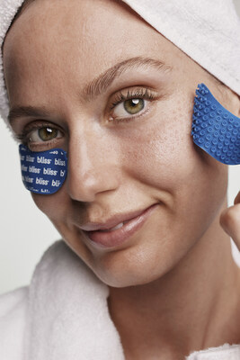 Model wearing Bliss Pro Supercharged Eye Masks