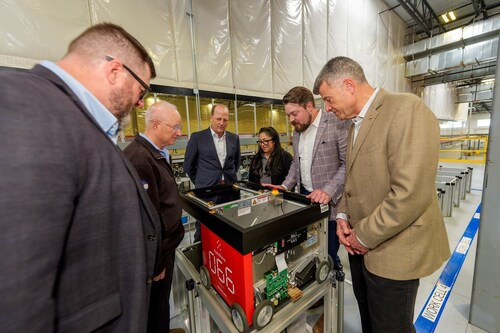 From left: UCHealth’s Paul Holbert, Aurora Mayor Mike Coffman, Medline’s Greg DeTuerk and Angelica Chavez, Swisslog’s Robert Humphry and Rene Simard of the Aurora Chamber of Commerce. From left: UCHealth’s Paul Holbert, Aurora Mayor Mike Coffman, Medline’s Greg DeTuerk and Angelica Chavez, Swisslog’s Robert Humphry and Rene Simard of the Aurora Chamber of Commerce.