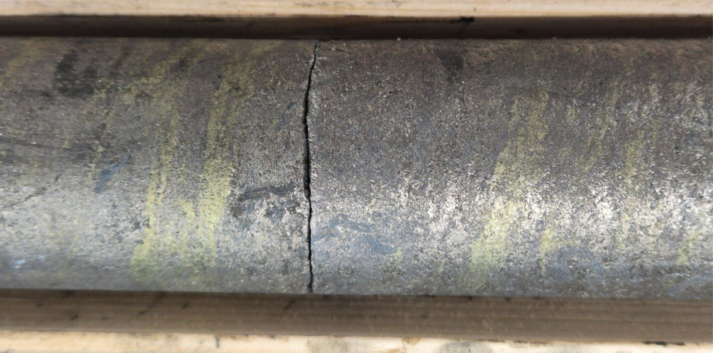 Photo 1: Massive pyrrhotite with about 10% chalcopyrite in regular bands at 85 degrees core angle . Center of photo was taken at 243.75m in hole CUP26-06 (CNW Group/Cupani Metals Corp.) Photo 1: Massive pyrrhotite with about 10% chalcopyrite in regular bands at 85 degrees core angle . Center of photo was taken at 243.75m in hole CUP26-06 (CNW Group/Cupani Metals Corp.)