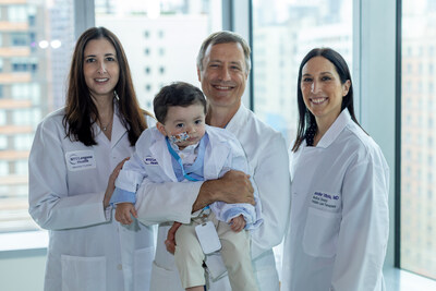 Baby Benjamin Carstens with pediatric hepatologist Dana L. Goldner, MD, pediatric liver surgeon Adam Griesemer, MD, and pediatric hepatologist Jennifer M. Vittorio, MD.  Credit: NYU Langone Health