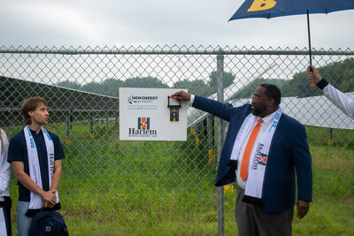 Superintendent Terrell Yarbrough flips the ceremonial switch on the Harlem School District Community Solar Project