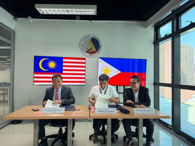 (L–R) Datuk Mohd Jimmy Wong Abdullah, Chairman of My Blockchain Infrastructure Sdn. Bhd.; Henry R. Aguda, Secretary of the Department of Information and Communications Technology (DICT) of the Philippines; and Ronald Allan M. Aquino, Chairman of Zetrix Philippines Inc., during the exchange of a Memorandum of Understanding to collaborate on implementing the Philippines' public blockchain infrastructure based on the Zetrix protocol. (PRNewsfoto/Zetrix) (L–R) Datuk Mohd Jimmy Wong Abdullah, Chairman of My Blockchain Infrastructure Sdn. Bhd.; Henry R. Aguda, Secretary of the Department of Information and Communications Technology (DICT) of the Philippines; and Ronald Allan M. Aquino, Chairman of Zetrix Philippines Inc., during the exchange of a Memorandum of Understanding to collaborate on implementing the Philippines' public blockchain infrastructure based on the Zetrix protocol. (PRNewsfoto/Zetrix)