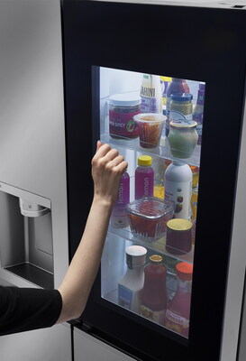 The LG InstaView™ refrigerator allows users to check its contents without opening the door by simply knocking twice on the glass panel. The LG InstaView™ refrigerator allows users to check its contents without opening the door by simply knocking twice on the glass panel.