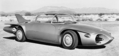 The 1956 Firebird II concept car was one of the industry's first vehicle concepts that explored automated driving.  The concept had an electronic brain that connected to a future highway called the Safety Autoway, which was equipped with metallic conductor embedded in the roadway.   The conductor would allow the car to drive in automated mode.