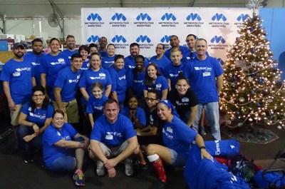 WellCare employees sorted donations and assisted visitors with registration and holiday shopping at Metropolitan Ministries' annual holiday tent in Tampa, Fla.