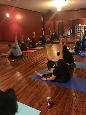 Injured veterans experience the restorative powers during a tranquil yoga class.