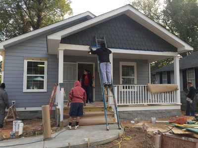 Wounded Warrior Project veterans volunteer to help build a home for a family.