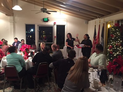 Veterans and their families enjoy a Wounded Warrior Project hosted holiday dinner.