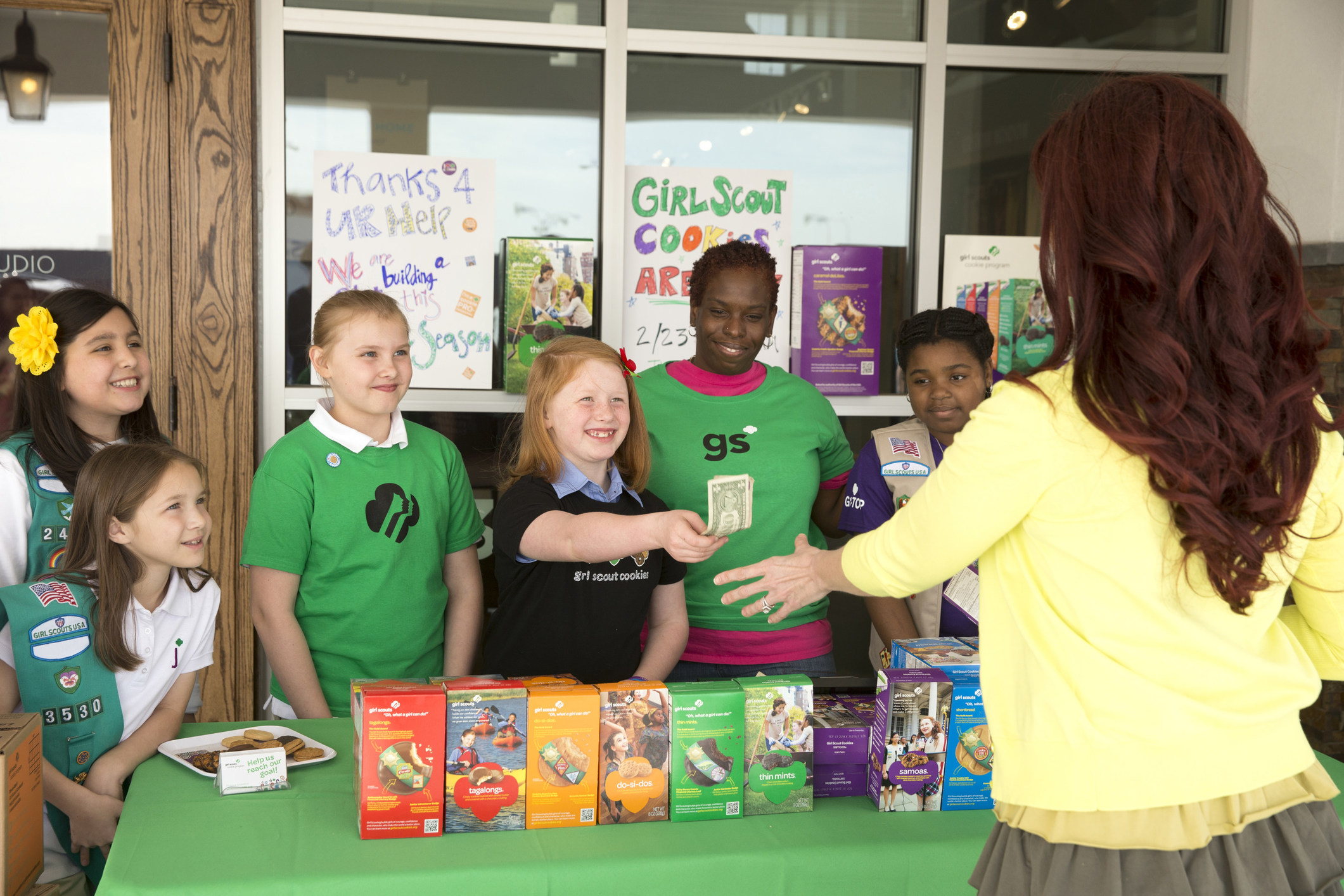 girl-scouts-of-the-usa-celebrates-100-years-of-girl-scouts-selling-cookies