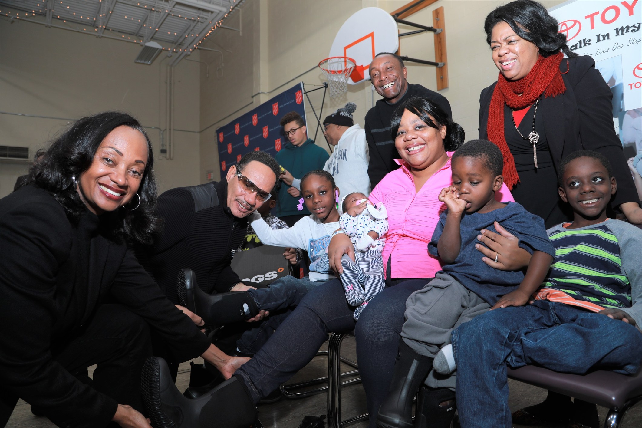 Toyota Turns Detroit Auto Show Focus to Helping the Community By Donating Winter Boots and Socks to