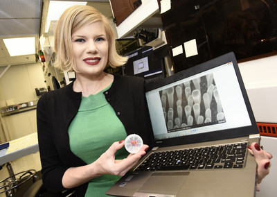 IBM inventors break US patent record with 8,088 patents granted in 2016, the company's 24th consecutive year of patent leadership. Master Inventor Emily Kinser, co-inventor on three patents granted to IBM in 2016, with next-generation 3D nanostructure shown at 100,000x magnification, inspired by US Patent #9,406,561, an invention that enables computer chips stacked on top of each other directly with no interface, a process called "3D Integration." (Photo Credit: Michael Pollio/Feature Photo)