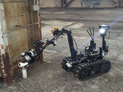 QinetiQ North America's TALON tactical robot shown with Persistent System's MANET radio.