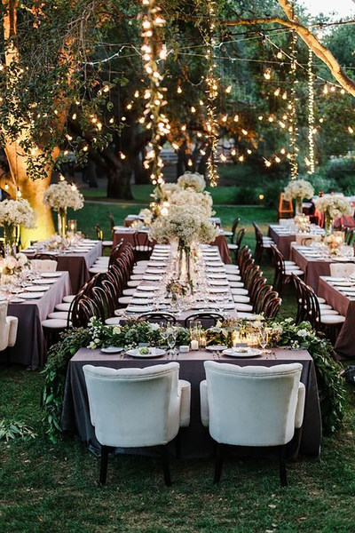 Inspired by the Pantone Color of the Year, Greenery, which symbolizes a reconnection with nature, one another and a larger purpose, we're seeing a rise in decor going au naturel and couples giving back with their weddings in more ways than one. Photo courtesy of Steve Steinhardt Photography and The Knot.