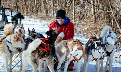 Richie Camden and the Breakaway Siberians take a break during a training run in Missouri.