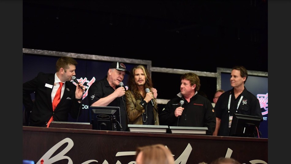Steven Tyler auctions his rare Hennessey Venom GT sports car for Janie's Fund, his philanthropic partnership with Youth Villages. From left, the Barrett-Jackson auctioneer, Craig Jackson, Steven Tyler, John Hennessey and Youth Villages CEO Patrick Lawler.
