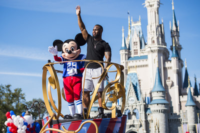 NFL Super Bowl star running back James White starred in a milestone Disney moment Monday, Feb. 6, 2017, - "going to Disney World" in a celebration parade down Main Street, U.S.A. at Magic Kingdom Park in Lake Buena Vista, Fla. White, who helped rally his team to a dramatic 34-28 overtime win over Atlanta in Super Bowl LI, continues a Disney tradition dating to 1987. (Disney)