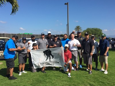 Wounded Warrior Project veterans pose for a picture at the Salute military Golf Association tournament.