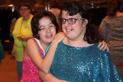 Two Guests of Night to Shine in their Donated Dresses