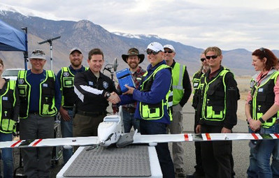 Drone America presents the long-distance package flown to the Nevada UAS Test Site Director, Dr. Chris Walach on February 15th, 2017.  Credit: Mark Barker, NIAS.