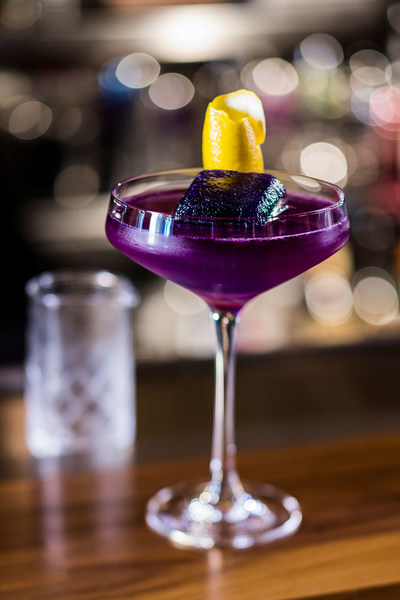 The Hope Diamond featuring Grey Goose, Combier Pamplemousse Rose Liqueur, Lemon, Pea Flower Tea, Diamond Ice Cube