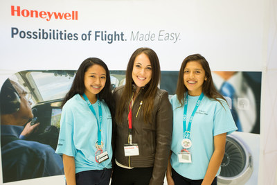 Kiah Erlich, Honeywell director of Flight Services, with CSO Jessica (L) and CSO Melany (R) from Sheely Farms Elementary School at a Honeywell Hometown Solutions event in Phoenix.