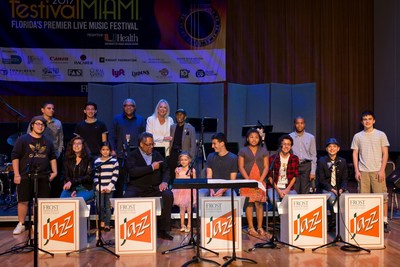 Canon Solutions America's Valerie Belli joins trumpeter Jon Faddis, saxophonist Jimmy Heath, drummer Ignacio Berroa and young musicians from the Frost School of Music's Shalala Music Reach Program on stage.