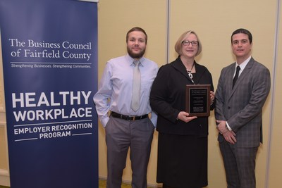 Barbara Valus, Director of Human Resources, Cartus,  accepts a Healthy Workplace Award from the Business Council of Fairfield County