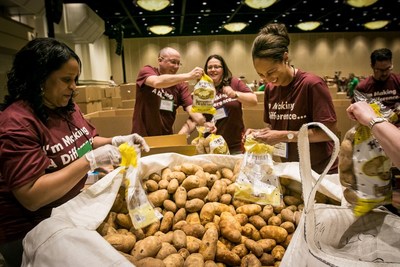 Over 400 BJ's Wholesale Club Team Members came together during the company's Annual Team Member Conference in Orlando, Florida to build 4,500 Healthy Pantry Boxes and repack 40,000 pounds of farm-fresh potatoes into family-sized packs for Second Harvest Food Bank of Central Florida.