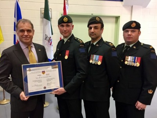 VIA Rail Canada was honoured today as the best employer in Quebec by the Canadian Forces Liaison Council in recognition of the company’s outstanding support for members of Canada’s Reserve Forces. On the picture: Yves Desjardins-Siciliano, President and CEO, VIA Rail, Lieutenant Sebastien Langlais, Combat engineer officer, 34 Combat Engineer Regiment, et Senior project manager, Rolling stock, VIA Rail; Major Daniel Doran, 34 Combat Engineer Regiment; et Adjudant Jean-Philippe Léonard, 34 Combat Engineer Regiment. (CNW Group/VIA Rail Canada Inc.)