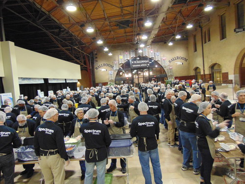 Spectrum Brands employees packed 62,000 meals for needy families at their annual sales and marketing meeting in St. Louis.