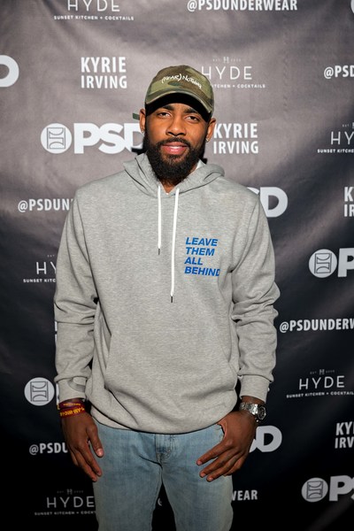 Kyrie Irving on red carpet at his PSD Underwear event celebrating sale of 100,000th pair of signature briefs.