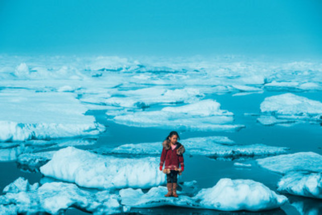 On July 1, 2016, an Iñupiat girl Amaia, 11, stands on a ice floe on a shore of the Arctic Ocean in Barrow, Alaska. The anomalous melting of the Arctic ice is one of the many effects of global warming that has a serious impact on the life of humans and wildlife. © UNICEF/UN056164/Sokhin (CNW Group/UNICEF Canada)