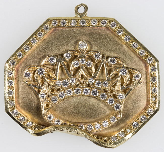 Rap artist Tupac Shakur's gold and diamond medallion obtained from a close family relation. It is believed that the indentation at bottom was caused by a bullet strike from the mortal wounding of Shakur in Las Vegas on Sep. 13, 1996. The medallion will be sold at "The Black Heritage Auction" in Brooklyn, N.Y. on April 7th, 2017, the same day Shakur will be inducted into the Rock & Roll Hall of Fame a few blocks away.