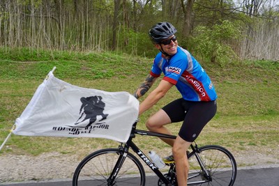 Veterans participate in a biking event and represent Wounded Warrior Project.